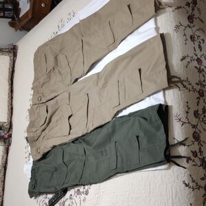 3 pair of LA Police Gear Tactical pants. 2 khaki --1 Army green. W 38xL 32.